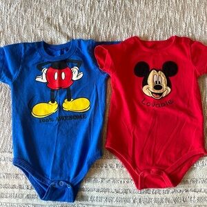 Pair of Disney Onesie t-shirts. Size 18mo